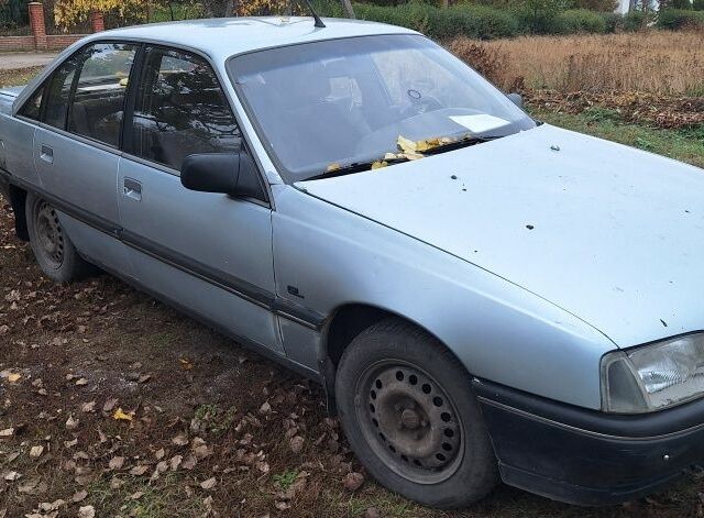 Серый Опель Омега, объемом двигателя 2.3 л и пробегом 300 тыс. км за 1800 $, фото 1 на Automoto.ua