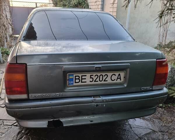 Сірий Опель Омега, об'ємом двигуна 2 л та пробігом 100 тис. км за 1000 $, фото 1 на Automoto.ua