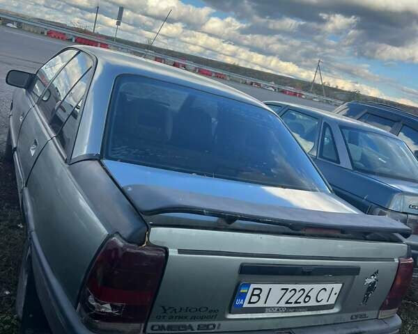 Серый Опель Омега, объемом двигателя 2 л и пробегом 200 тыс. км за 650 $, фото 4 на Automoto.ua