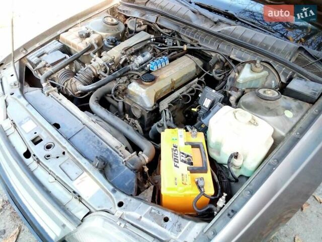 Сірий Опель Омега, об'ємом двигуна 2.4 л та пробігом 258 тис. км за 1900 $, фото 3 на Automoto.ua