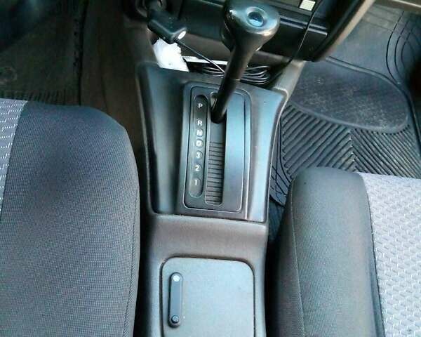 Сірий Опель Омега, об'ємом двигуна 2.4 л та пробігом 258 тис. км за 1900 $, фото 6 на Automoto.ua