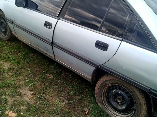 Серый Опель Омега, объемом двигателя 2 л и пробегом 250 тыс. км за 400 $, фото 1 на Automoto.ua