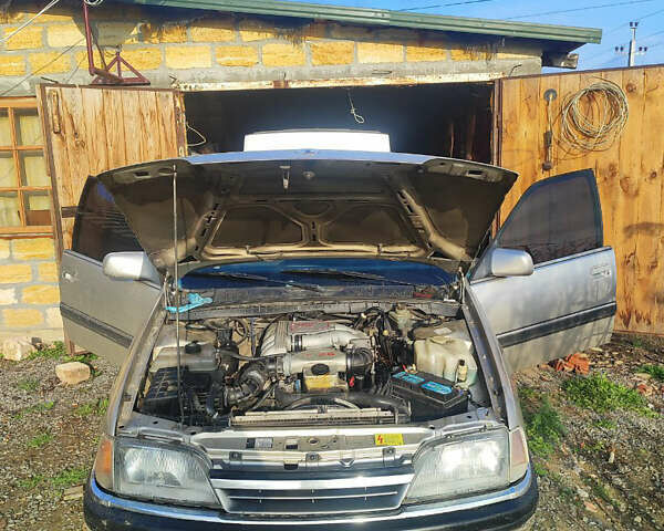 Серый Опель Омега, объемом двигателя 2.6 л и пробегом 250 тыс. км за 1250 $, фото 2 на Automoto.ua