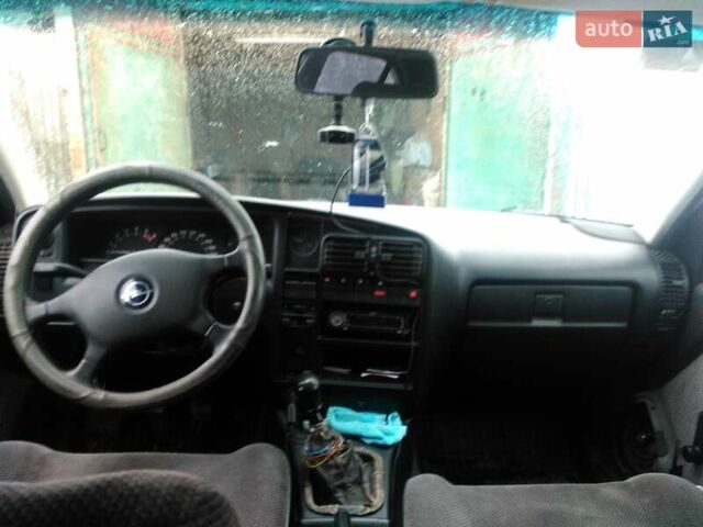 Серый Опель Омега, объемом двигателя 2.3 л и пробегом 320 тыс. км за 2000 $, фото 5 на Automoto.ua