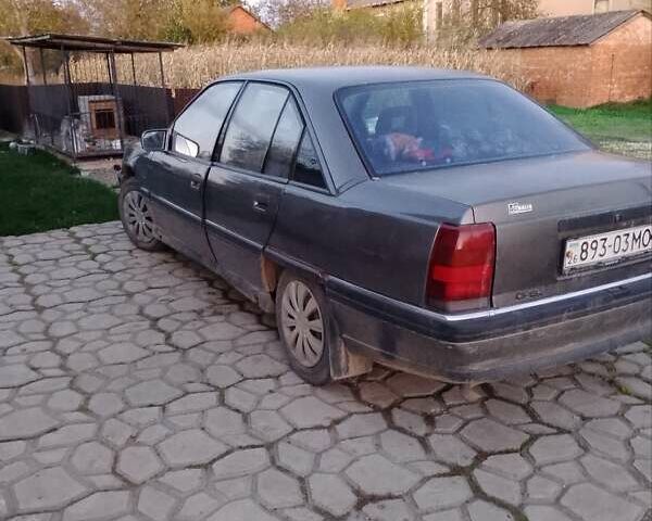 Серый Опель Омега, объемом двигателя 2 л и пробегом 320 тыс. км за 750 $, фото 2 на Automoto.ua
