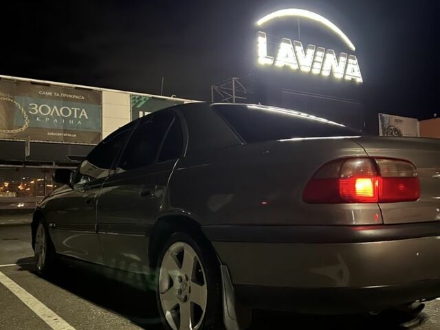 Серый Опель Омега, объемом двигателя 2 л и пробегом 248 тыс. км за 2600 $, фото 2 на Automoto.ua