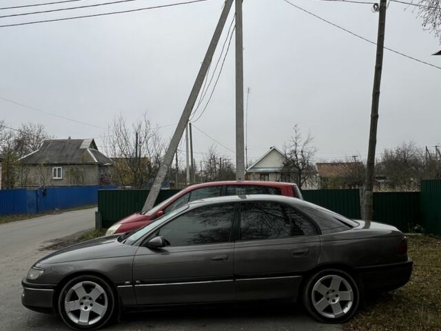 Серый Опель Омега, объемом двигателя 2 л и пробегом 248 тыс. км за 2600 $, фото 7 на Automoto.ua