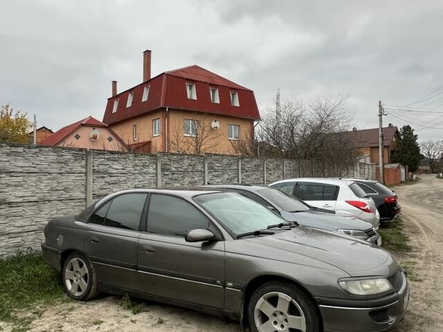 Серый Опель Омега, объемом двигателя 2 л и пробегом 248 тыс. км за 2600 $, фото 5 на Automoto.ua