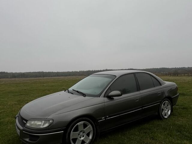 Серый Опель Омега, объемом двигателя 2 л и пробегом 248 тыс. км за 2600 $, фото 8 на Automoto.ua