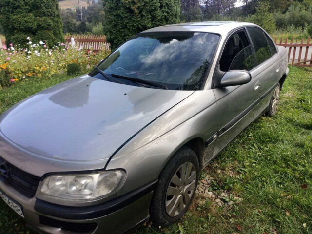 Сірий Опель Омега, об'ємом двигуна 2.5 л та пробігом 257 тис. км за 1650 $, фото 2 на Automoto.ua