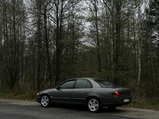 Серый Опель Омега, объемом двигателя 2 л и пробегом 248 тыс. км за 2600 $, фото 12 на Automoto.ua