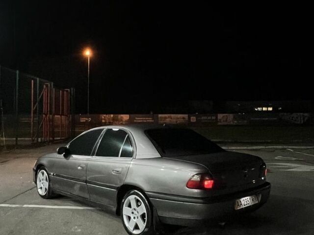 Серый Опель Омега, объемом двигателя 2 л и пробегом 248 тыс. км за 2600 $, фото 4 на Automoto.ua