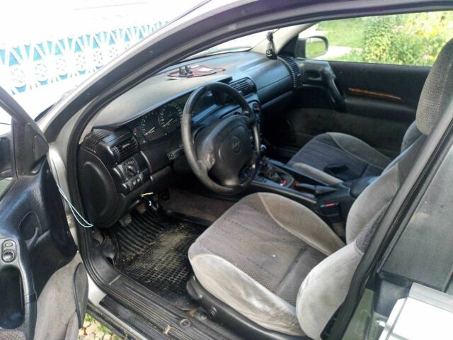 Сірий Опель Омега, об'ємом двигуна 2.5 л та пробігом 257 тис. км за 1650 $, фото 6 на Automoto.ua