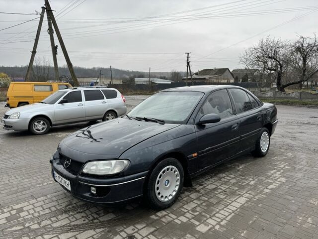 Серый Опель Омега, объемом двигателя 2 л и пробегом 350 тыс. км за 1499 $, фото 4 на Automoto.ua