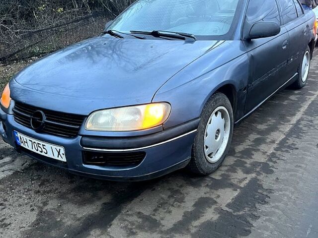 Серый Опель Омега, объемом двигателя 2 л и пробегом 390 тыс. км за 1000 $, фото 1 на Automoto.ua