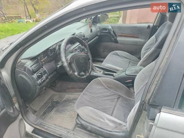 Сірий Опель Омега, об'ємом двигуна 2.5 л та пробігом 246 тис. км за 2200 $, фото 3 на Automoto.ua