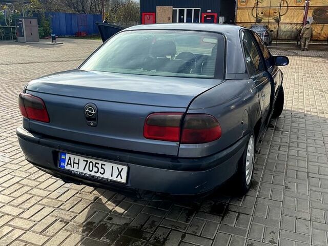 Серый Опель Омега, объемом двигателя 2 л и пробегом 390 тыс. км за 1000 $, фото 3 на Automoto.ua