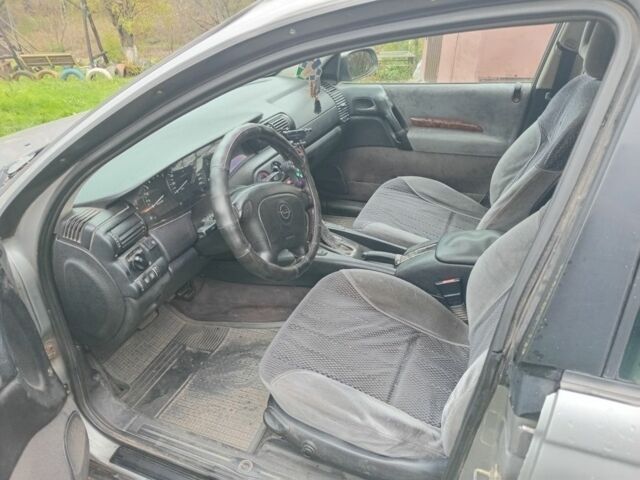 Серый Опель Омега, объемом двигателя 2.5 л и пробегом 246 тыс. км за 2200 $, фото 3 на Automoto.ua