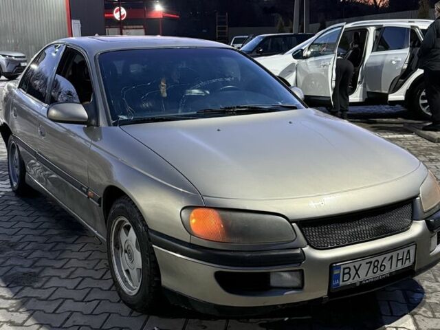 Серый Опель Омега, объемом двигателя 3 л и пробегом 253 тыс. км за 1900 $, фото 1 на Automoto.ua