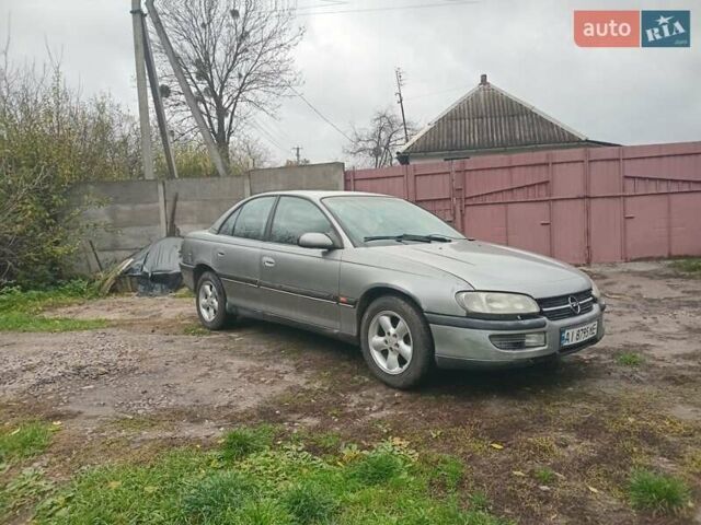 Сірий Опель Омега, об'ємом двигуна 2.5 л та пробігом 246 тис. км за 2200 $, фото 2 на Automoto.ua