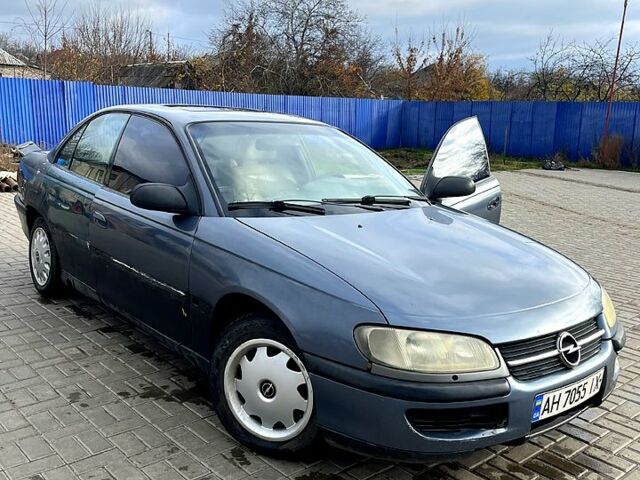 Серый Опель Омега, объемом двигателя 2 л и пробегом 390 тыс. км за 1000 $, фото 4 на Automoto.ua