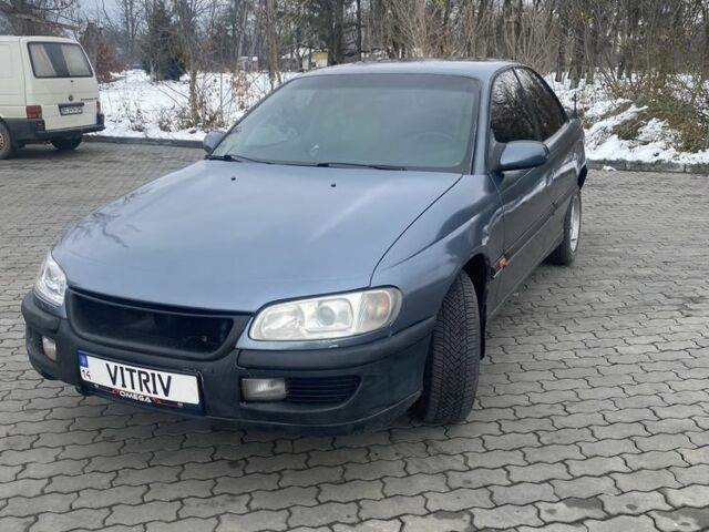 Сірий Опель Омега, об'ємом двигуна 2 л та пробігом 316 тис. км за 1400 $, фото 4 на Automoto.ua