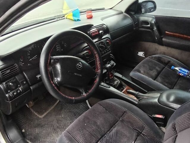 Серый Опель Омега, объемом двигателя 2 л и пробегом 470 тыс. км за 1700 $, фото 6 на Automoto.ua