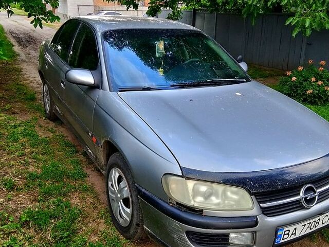 Сірий Опель Омега, об'ємом двигуна 2 л та пробігом 300 тис. км за 1100 $, фото 5 на Automoto.ua