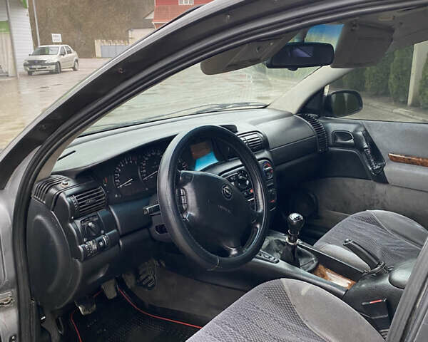 Сірий Опель Омега, об'ємом двигуна 2.5 л та пробігом 300 тис. км за 2300 $, фото 8 на Automoto.ua