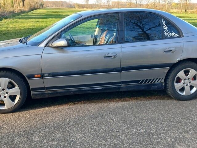 Серый Опель Омега, объемом двигателя 2 л и пробегом 390 тыс. км за 2324 $, фото 13 на Automoto.ua