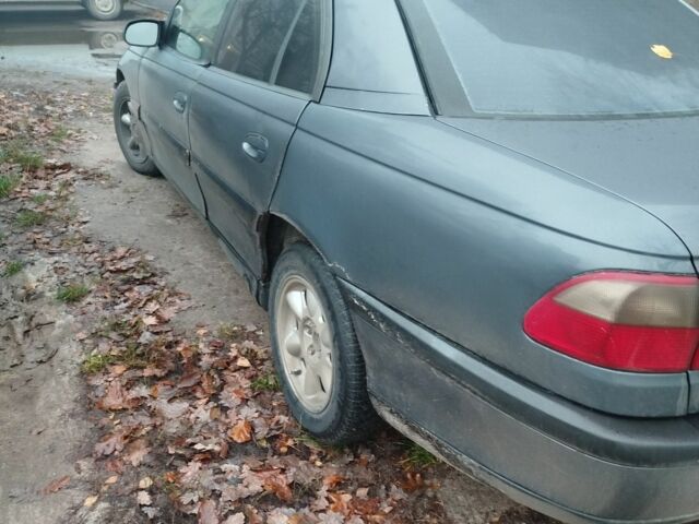 Серый Опель Омега, объемом двигателя 2.5 л и пробегом 345 тыс. км за 1300 $, фото 2 на Automoto.ua