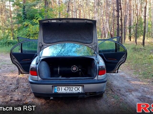 Сірий Опель Омега, об'ємом двигуна 2 л та пробігом 98 тис. км за 1300 $, фото 9 на Automoto.ua