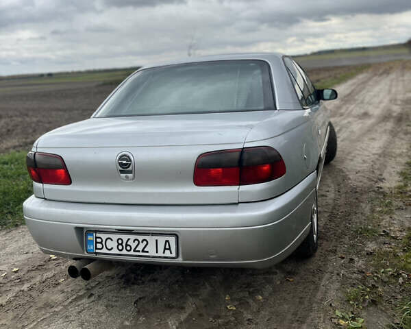 Серый Опель Омега, объемом двигателя 2.5 л и пробегом 300 тыс. км за 1600 $, фото 3 на Automoto.ua