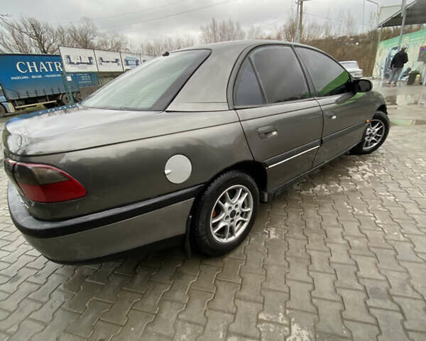 Сірий Опель Омега, об'ємом двигуна 2.5 л та пробігом 300 тис. км за 2300 $, фото 3 на Automoto.ua