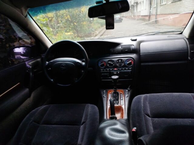 Сірий Опель Омега, об'ємом двигуна 3 л та пробігом 299 тис. км за 2800 $, фото 7 на Automoto.ua