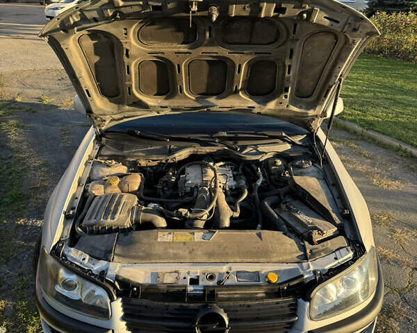 Серый Опель Омега, объемом двигателя 2.5 л и пробегом 462 тыс. км за 2800 $, фото 14 на Automoto.ua