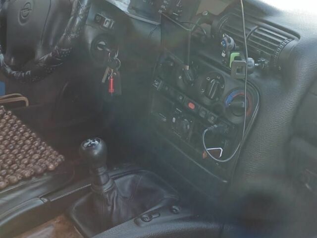 Серый Опель Омега, объемом двигателя 2 л и пробегом 390 тыс. км за 2324 $, фото 14 на Automoto.ua