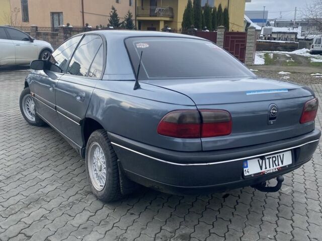 Сірий Опель Омега, об'ємом двигуна 2 л та пробігом 316 тис. км за 1400 $, фото 5 на Automoto.ua