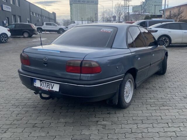 Сірий Опель Омега, об'ємом двигуна 2 л та пробігом 316 тис. км за 1400 $, фото 6 на Automoto.ua