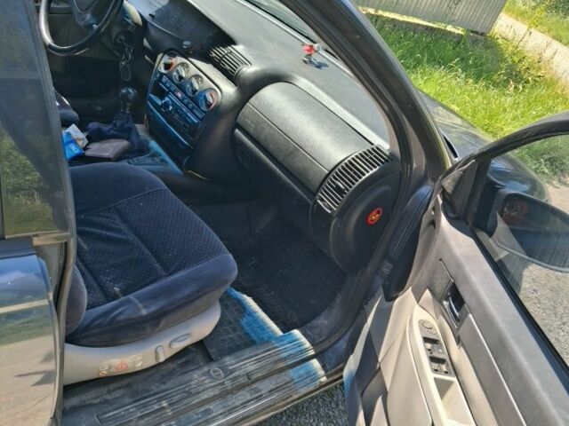 Сірий Опель Омега, об'ємом двигуна 2 л та пробігом 368 тис. км за 1350 $, фото 3 на Automoto.ua