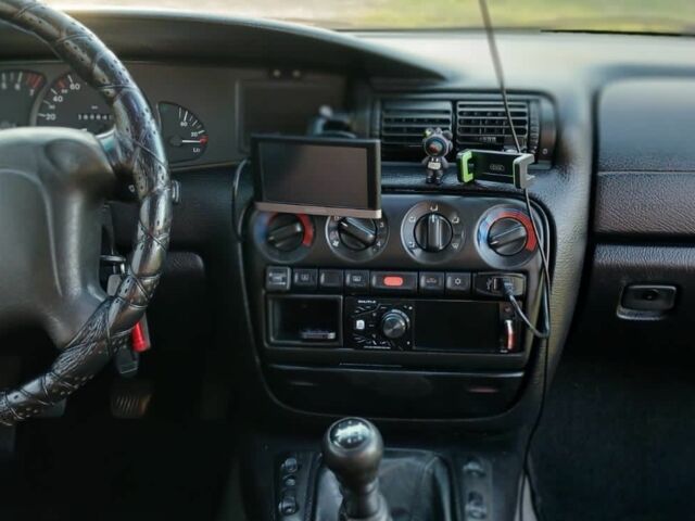 Серый Опель Омега, объемом двигателя 2 л и пробегом 390 тыс. км за 2324 $, фото 11 на Automoto.ua