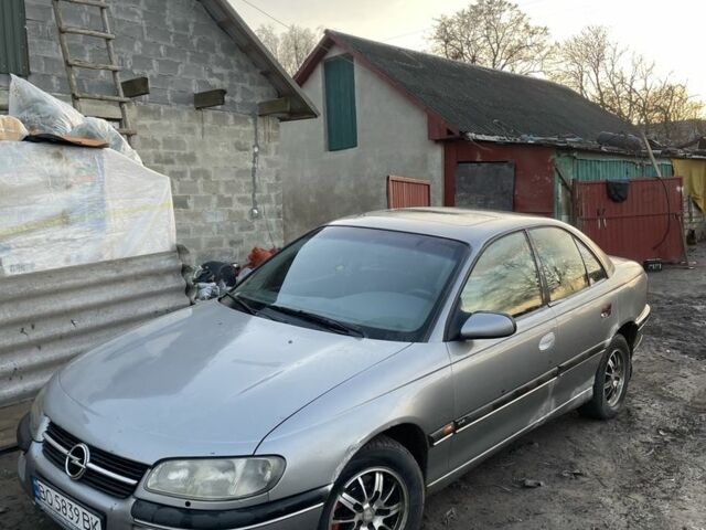 Серый Опель Омега, объемом двигателя 2.5 л и пробегом 300 тыс. км за 1699 $, фото 1 на Automoto.ua