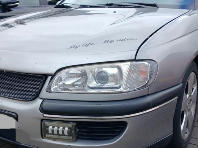 Серый Опель Омега, объемом двигателя 2 л и пробегом 390 тыс. км за 2324 $, фото 1 на Automoto.ua