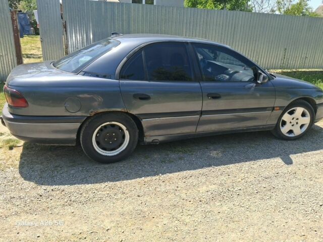 Сірий Опель Омега, об'ємом двигуна 2 л та пробігом 368 тис. км за 1350 $, фото 1 на Automoto.ua