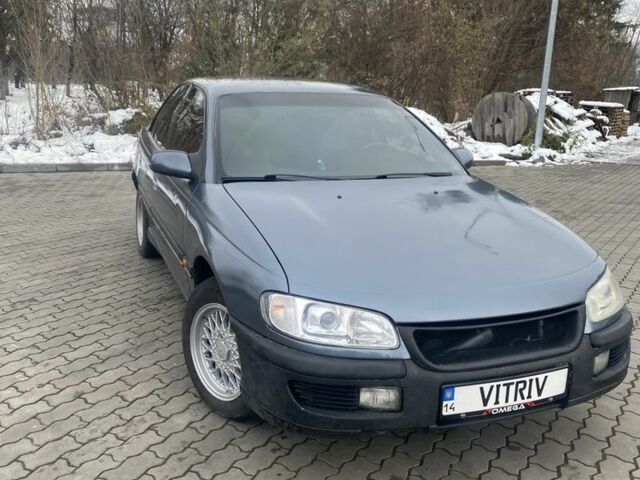 Сірий Опель Омега, об'ємом двигуна 2 л та пробігом 316 тис. км за 1400 $, фото 3 на Automoto.ua