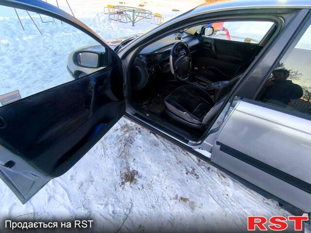 Серый Опель Омега, объемом двигателя 2 л и пробегом 325 тыс. км за 2200 $, фото 5 на Automoto.ua