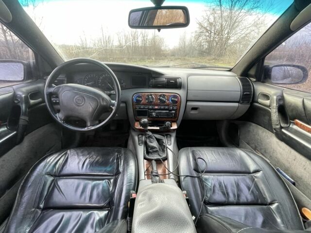 Сірий Опель Омега, об'ємом двигуна 2 л та пробігом 400 тис. км за 2000 $, фото 4 на Automoto.ua