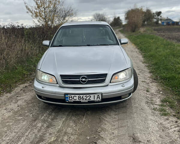 Серый Опель Омега, объемом двигателя 2.5 л и пробегом 300 тыс. км за 1600 $, фото 2 на Automoto.ua