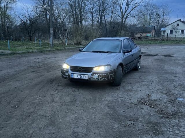 Серый Опель Омега, объемом двигателя 2.5 л и пробегом 277 тыс. км за 2199 $, фото 1 на Automoto.ua