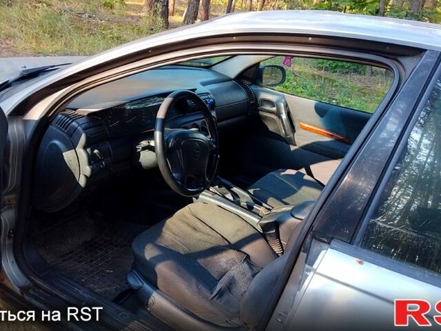 Сірий Опель Омега, об'ємом двигуна 2 л та пробігом 98 тис. км за 1300 $, фото 8 на Automoto.ua